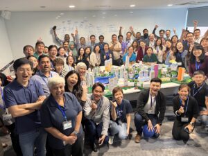 Corporate team creating a shared model during a Vision, Values, and Alignment experience