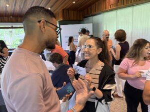 Colleagues building human connection through meaningful team conversations