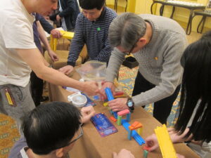 Team making collaborative decisions during an experiential team-building programme